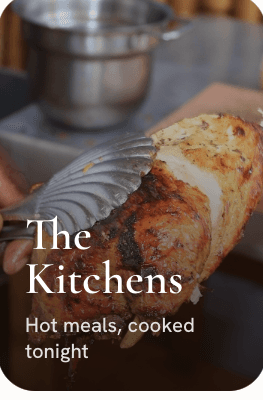A restaurant kitchen plating a dish to order